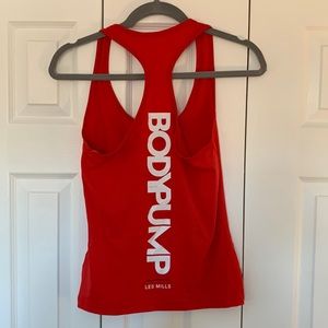 Red Les Mills BodyPump fitted tank.
